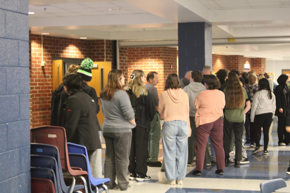 Many people in line to try all the different soups.
