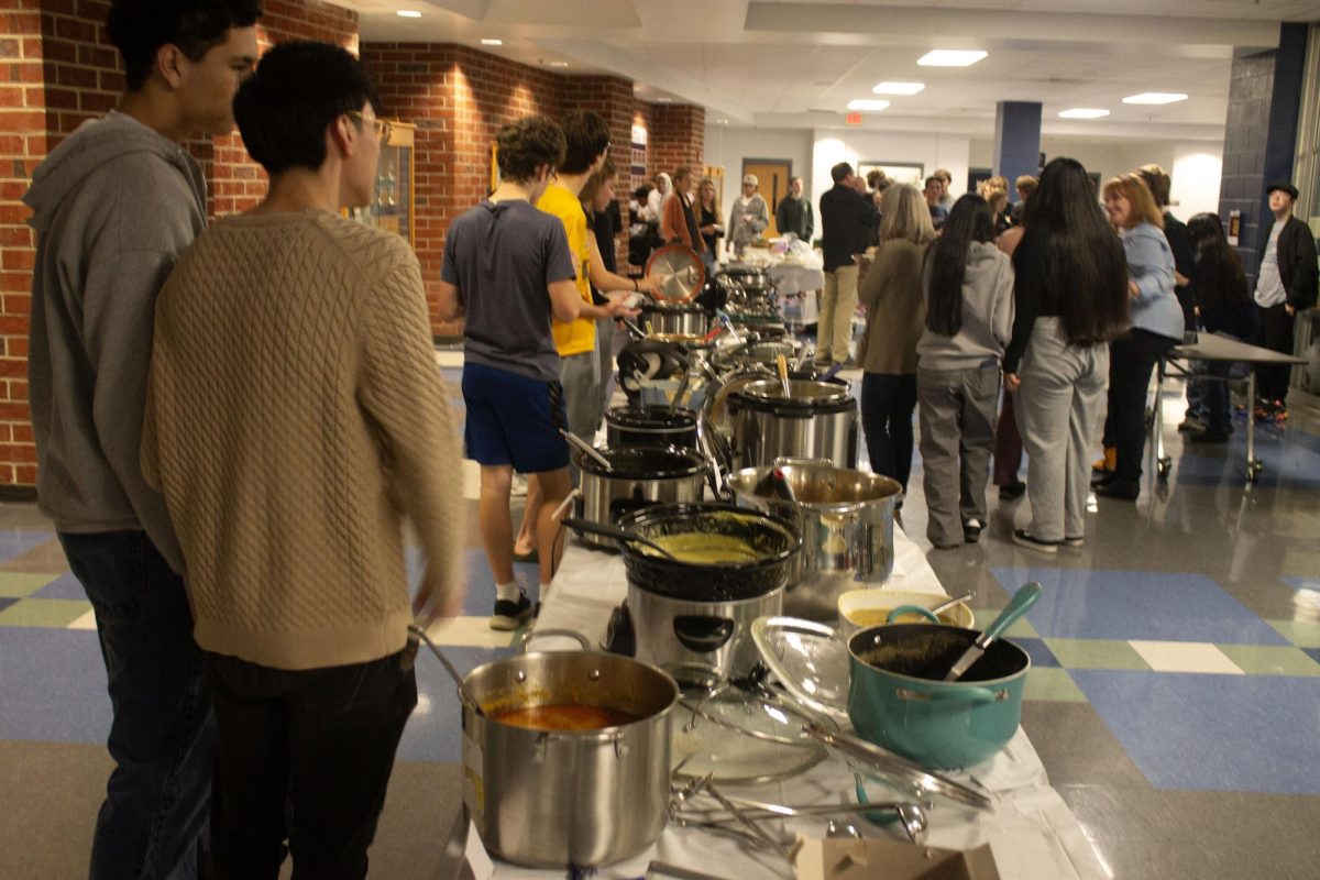 Tables filled with all of the various soups provided by families.