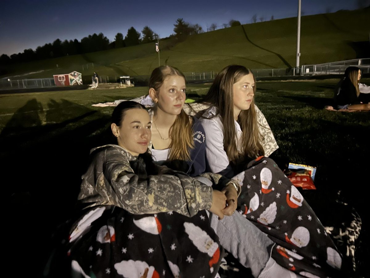 Freshman Bella Jones, Vera Heller and Delaney Dayton watch Barbie.