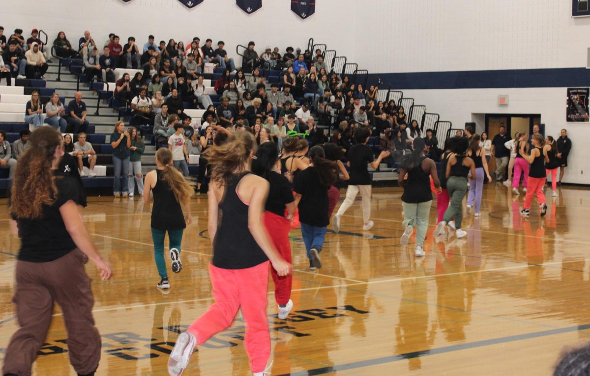 Harrisonburg High Schools Pep Rally sports introduction subsequently introduced the dancers. The dancers were in great sync with each other and they didn't miss a beat. They danced for everyone in the gym and it was very successful in the end.