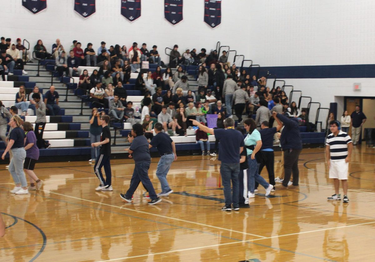 After the original basketball players we introduced the Unified basketball players next. There were plenty of them and each one of them got the same amount of cheer and love from the students and teachers in the stands. This Pep Rally at Harrisonburg High School was certainly the right place for them and others!