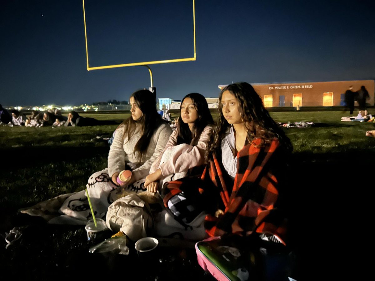 Sophomore Abril Rivero Rodriguez, Daniela Martinez-Villa and Isabella Ruiz Rodriguez attend the WiSTEM movie night.