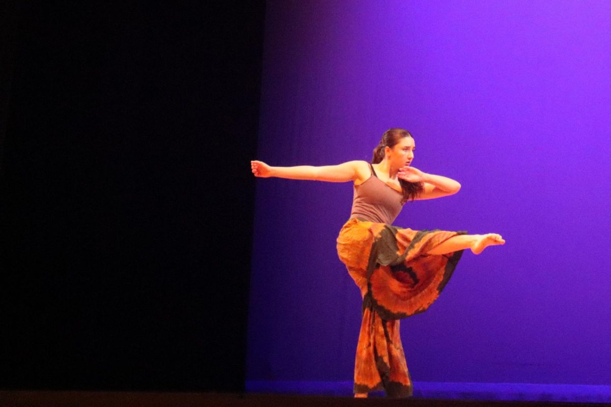 Senior Lydia King performs her solo that she choreographed.