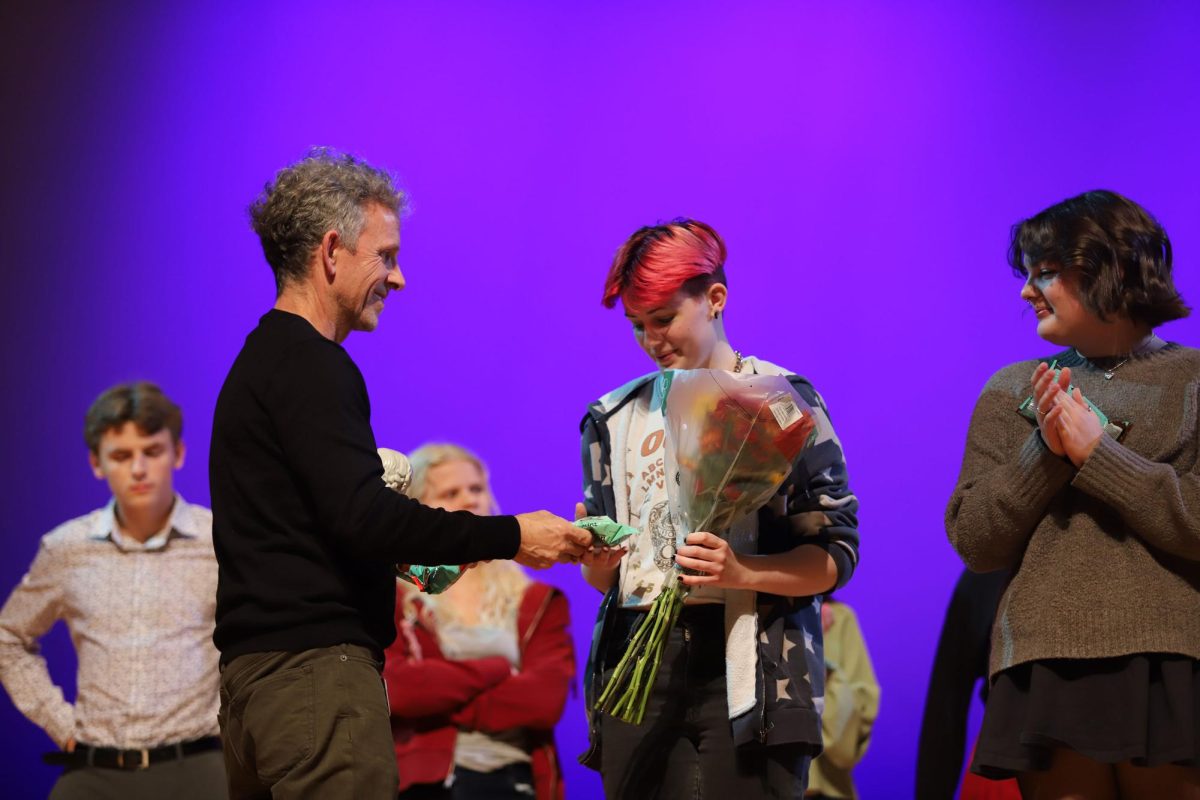 Junior Wren Hamner receives award for placing as runner-up in the competition. "I learned this monologue at a summer camp and it feels pretty good to get runner up with it," Hamner said.