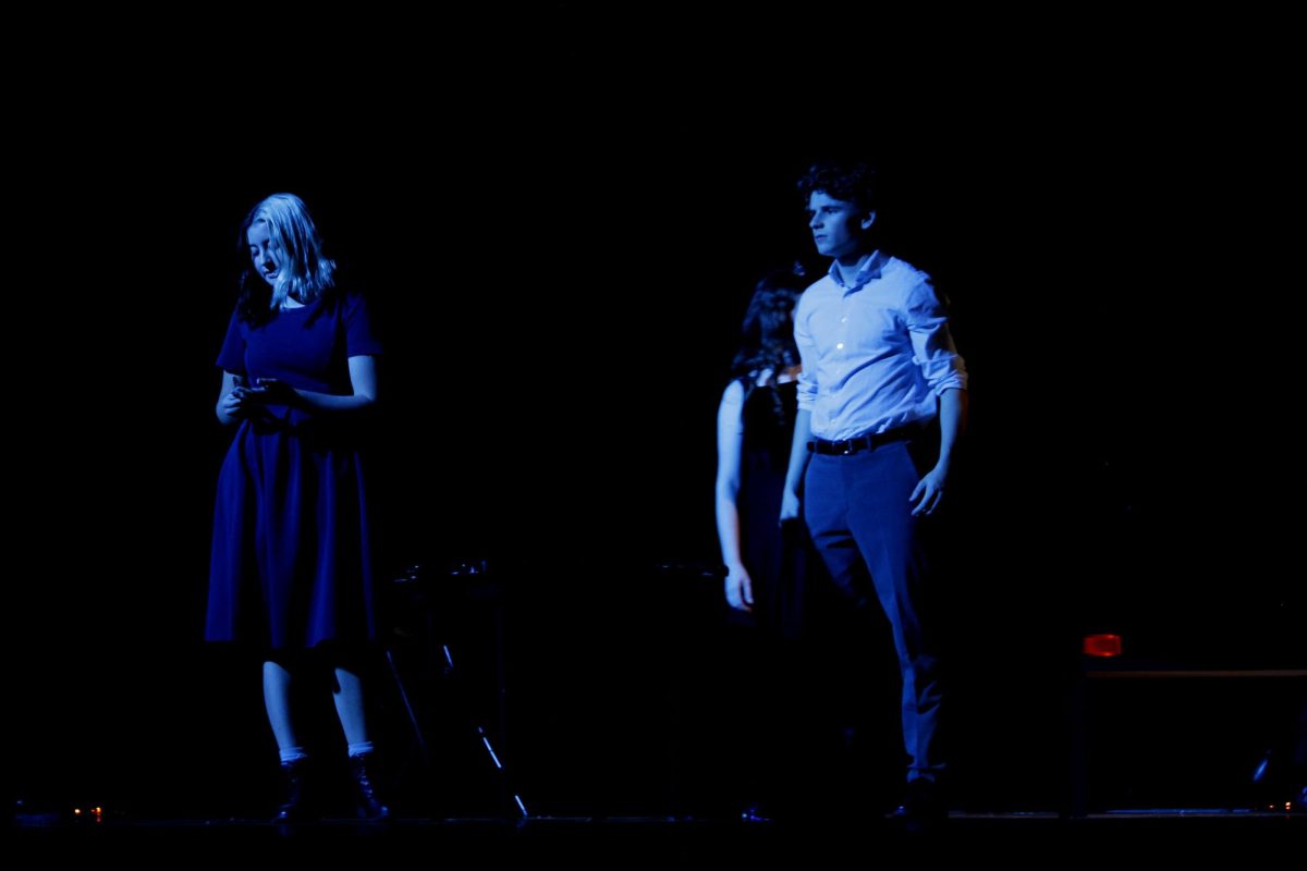 Young Scrooge (Louis Gibson) gets heartbroken by a young woman(Abby Bloss)