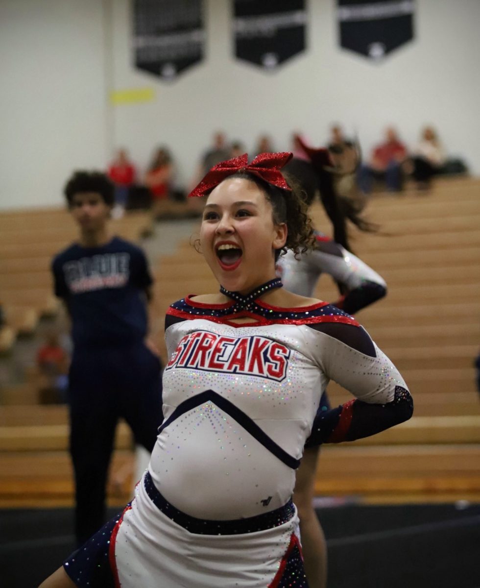 Mariah Nelson performing at a cheer competition.