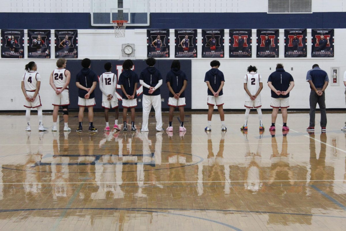 Boys varsity basketball falls short in close buzzer beating game against Page County High School