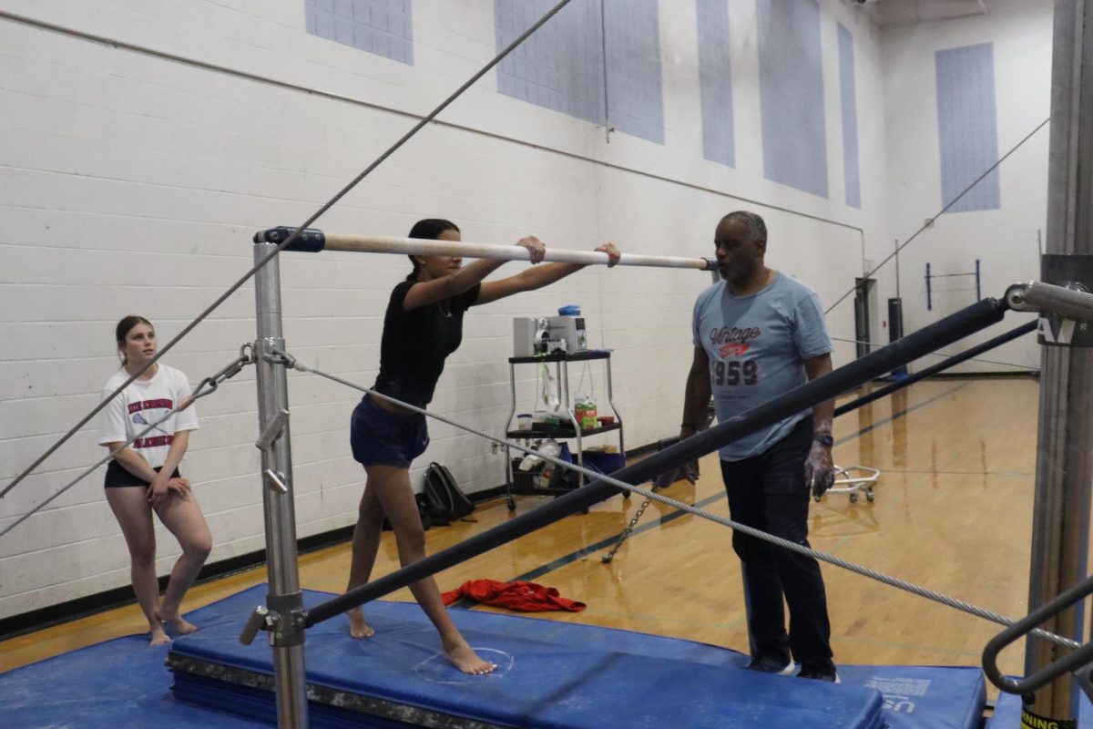 Pones working her pull over on bars.