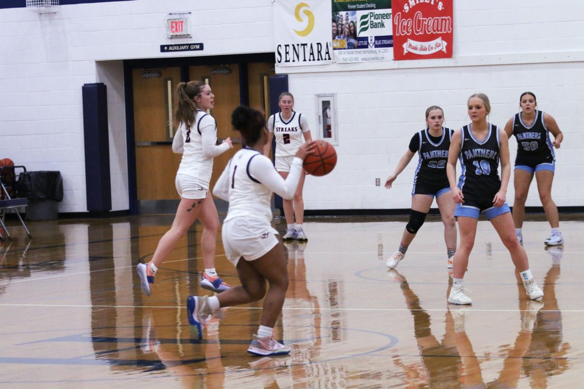 Anelys Segura Perdomo dribbles the ball down the court