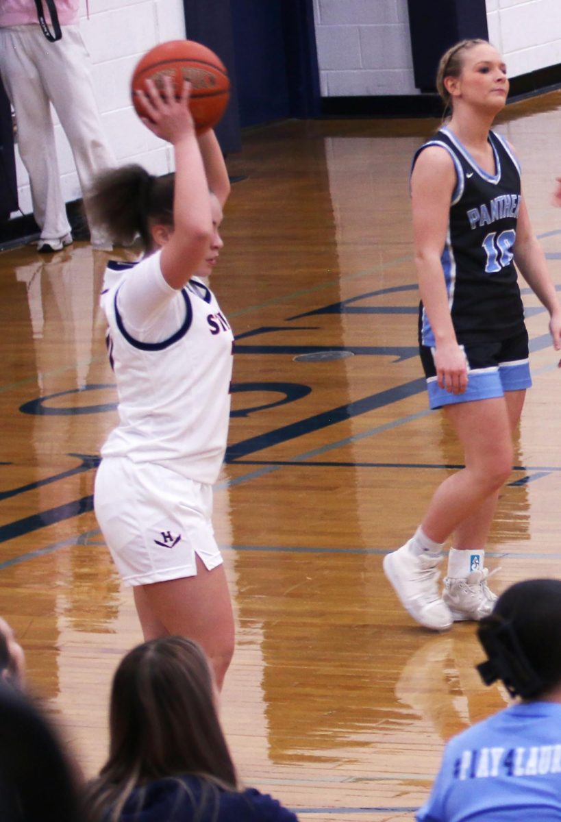 Ah-Ghia Jones throwing the ball into play