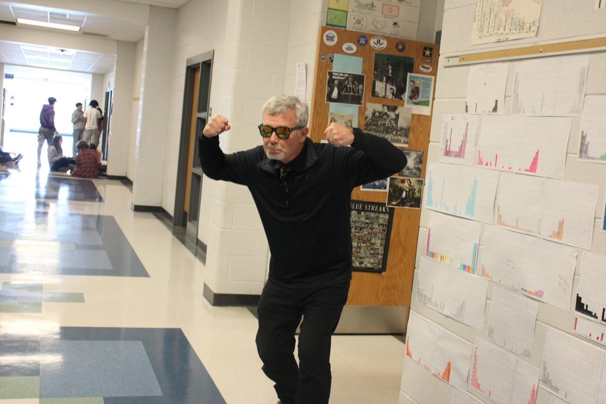 Mr. Healy posing with his spy attire.