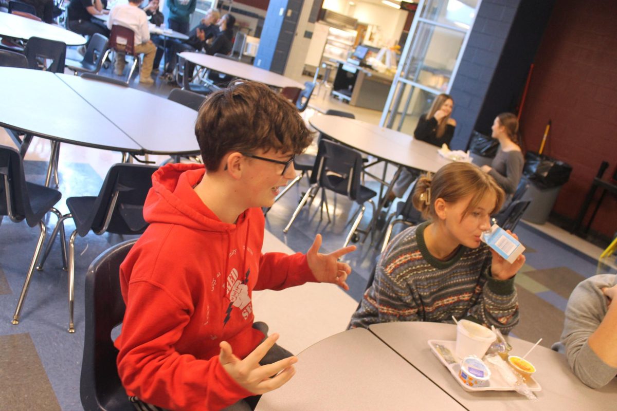 Shea Gibson Conversing with his table