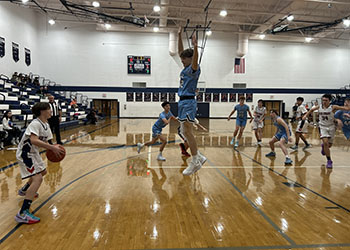 Page County attempting to guard Lincoln Rexrode.