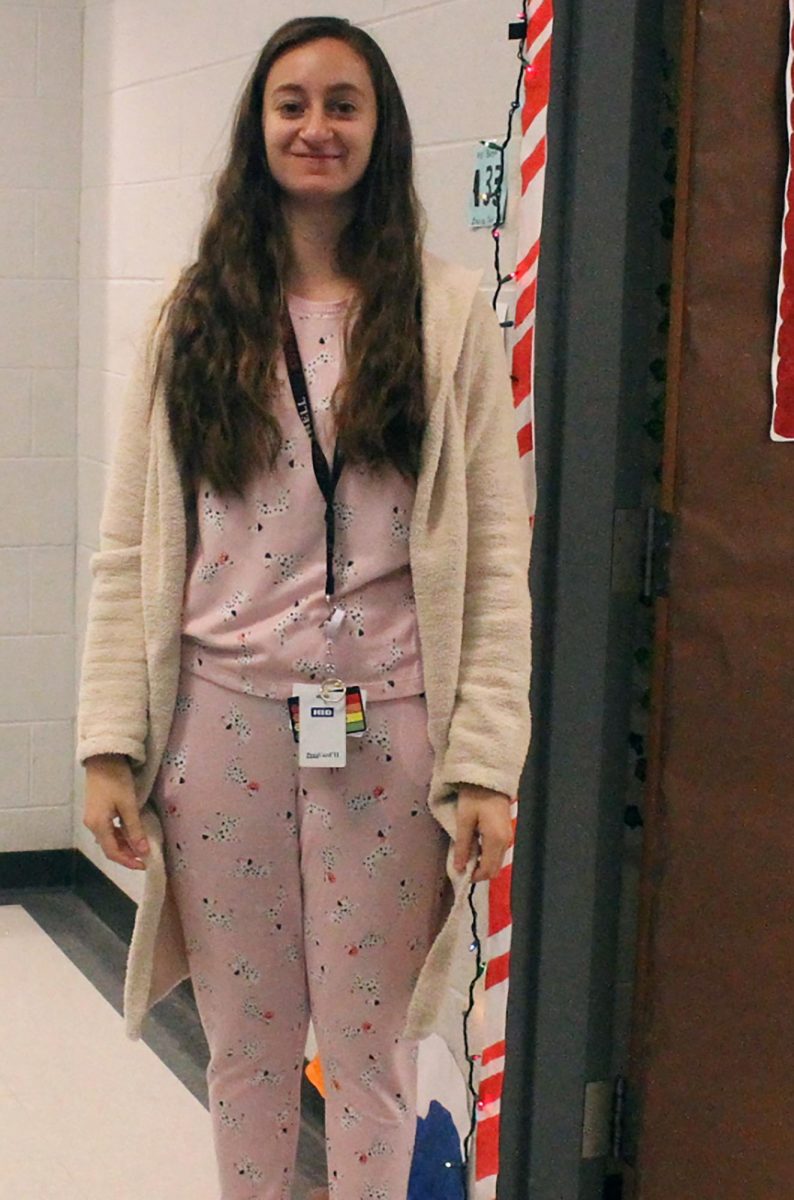 Ms. Berger in her PJs and robe.