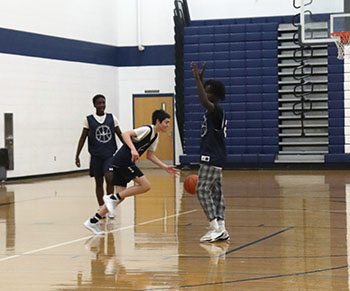Running down the court for a basket