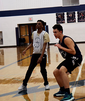 Two players getting ready to defend