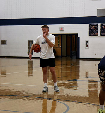 Coach blowing his whistle