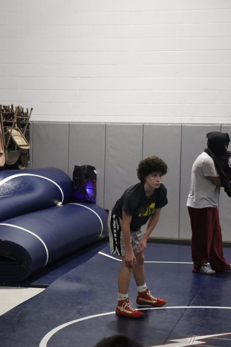 Mason George getting ready to wrestle his teammate.