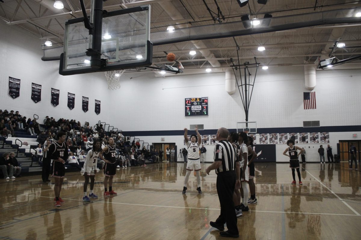 Yandel Robles makes a shot in the hoop