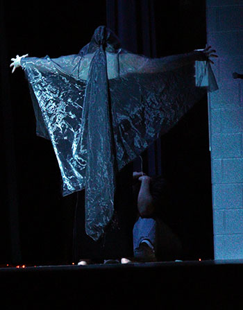 Elsie Corriston and Hazel Pinnow perform "All Around, My Dear" to tell the story of a haunting after death.