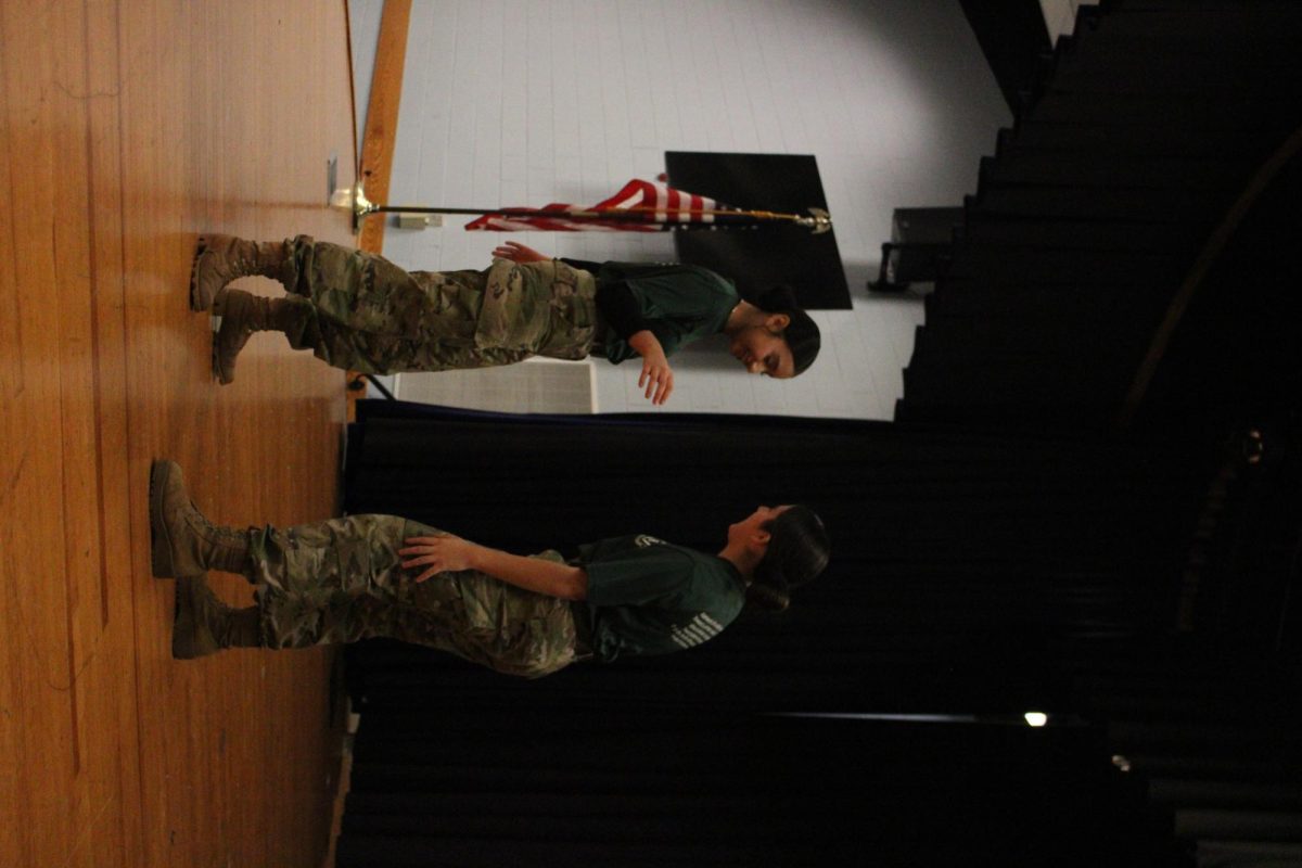 Amy Matamoros and Giselle Cano Practicing before the middle schoolers entered the room.
