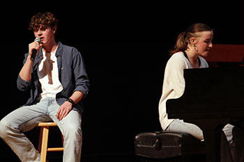 Juniors Billy Perritt and Annie Snow performing a song that represented Friends, Family, loved ones, and how we don't spend enough time with them at the HHS Fine Arts Showcase.