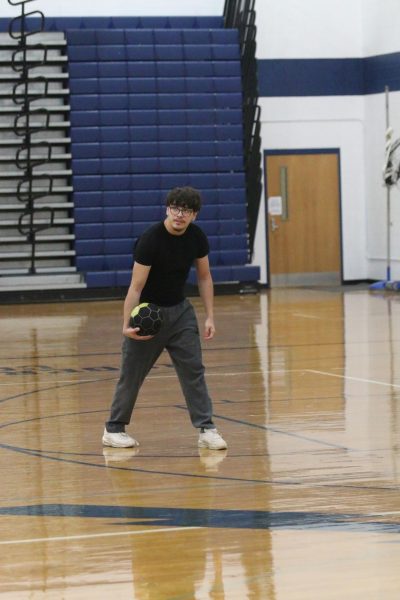 Team B getting ready to serve the ball.