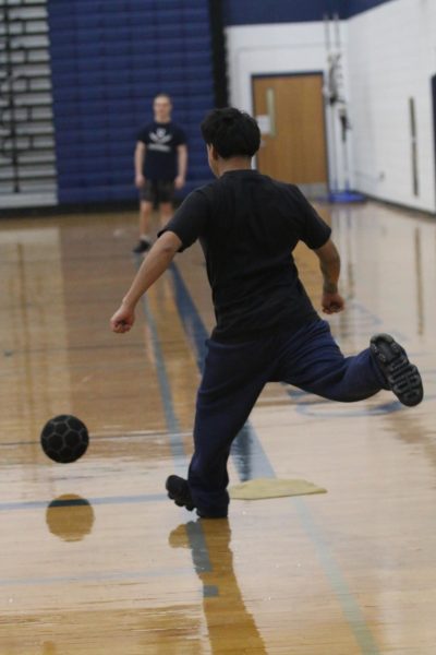 Team A kicks the ball as they already have two outs.