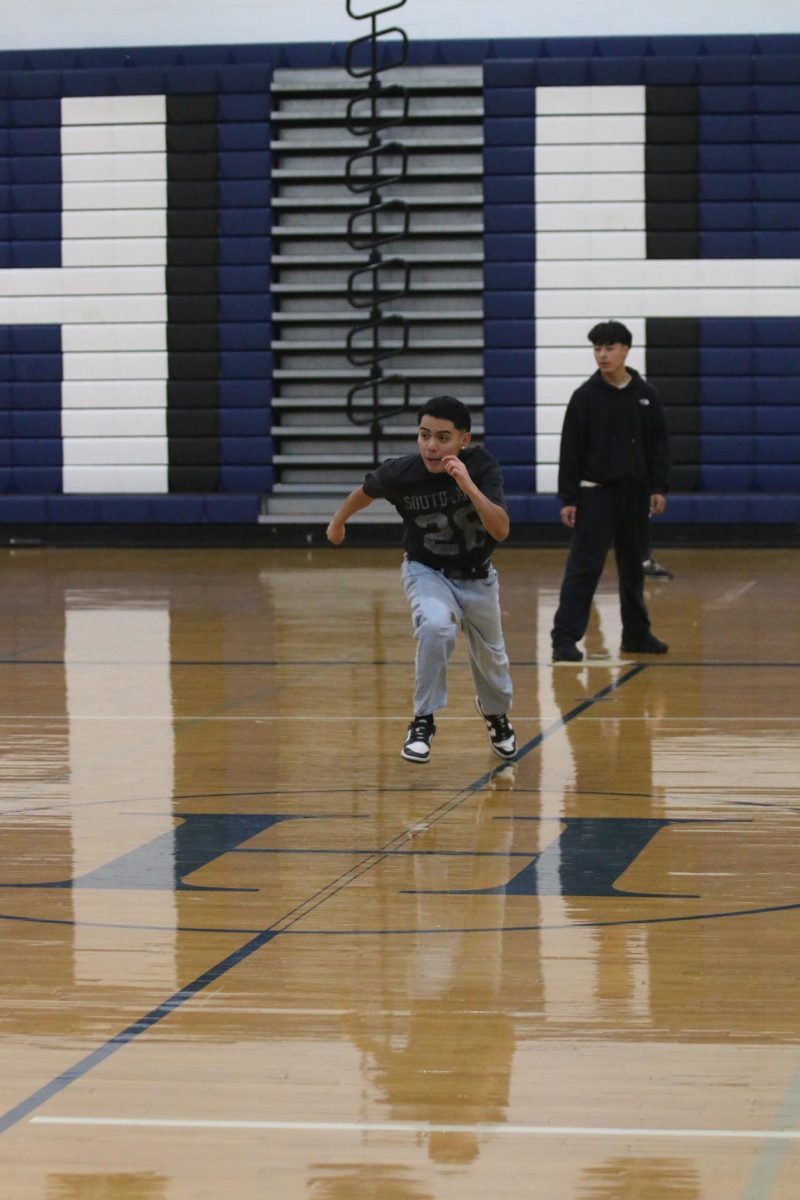 Students play kickball