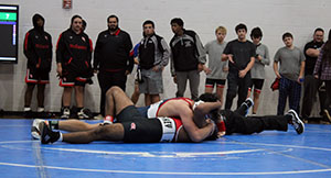 Freshman Enrique Hernandez Erazo spread out with his opponent.