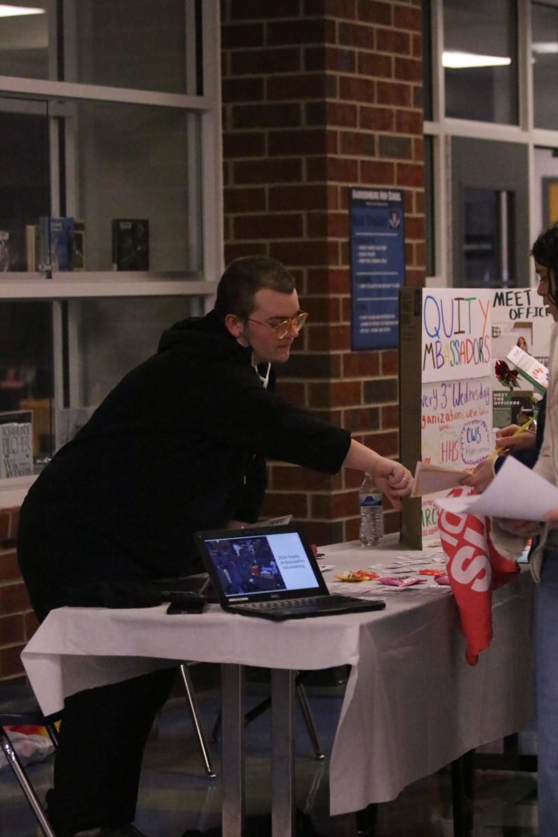 Teachers helping students out.
