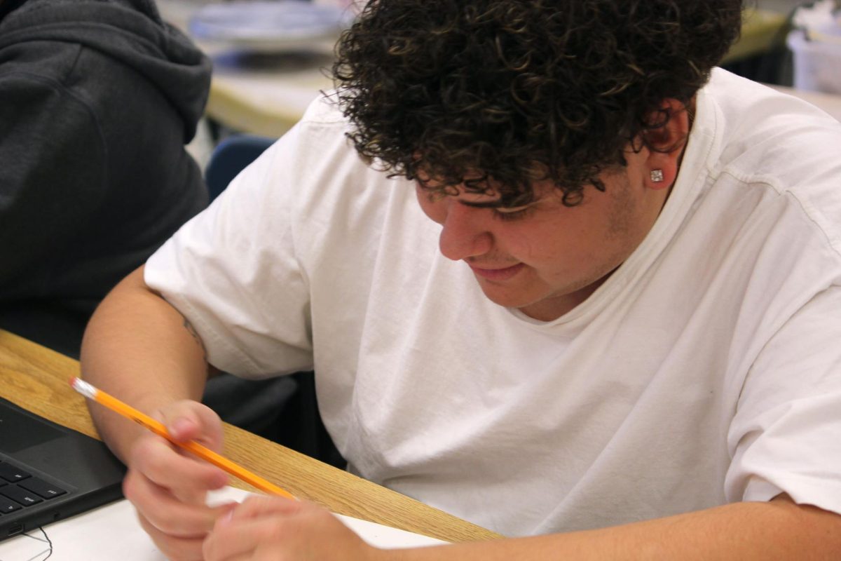 Student finishes his multimedia art project.