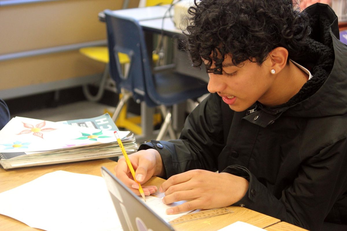 Student finishes drawing.