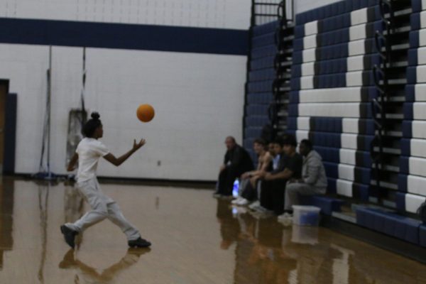 Victor Diaz catches the ball to give the opposing team a out.