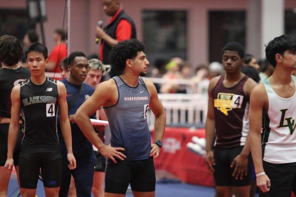 Filipo Toelau runs at Liberty track meet