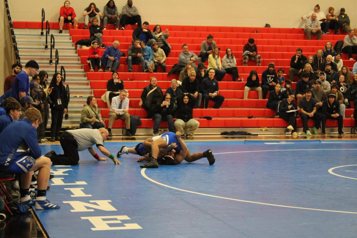 HHS wrestler gets defeated by Spotswood High School