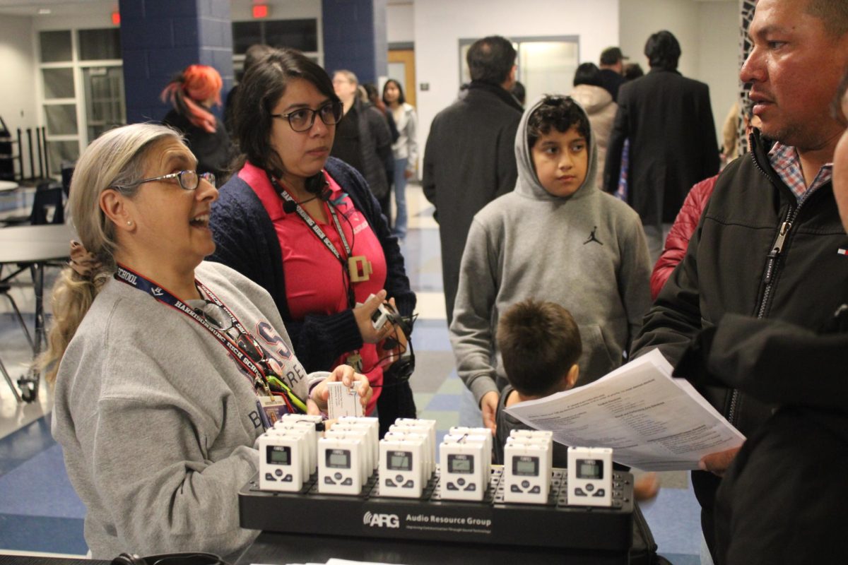 Yolanda blake helps answer questions for spanish speaking families