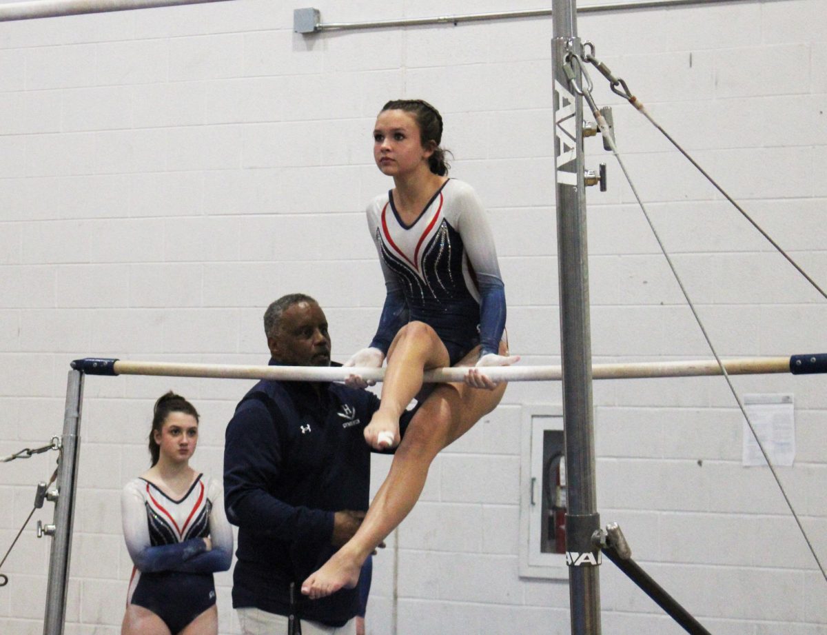 Freshman Danica Doberstein tries to get to the second bar.