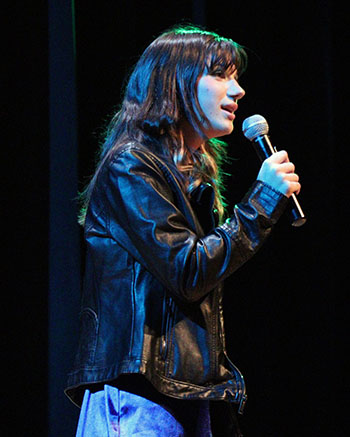 Lila Hostetler singing a song she wrote called "Unseen Red Flags."