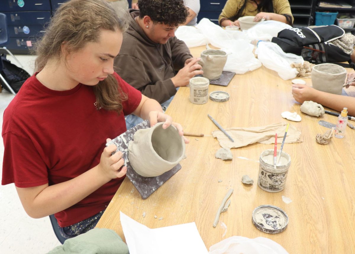 Alonso Vaughan with his pottery.