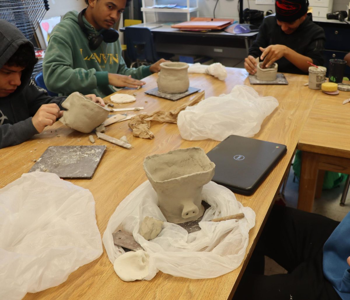 Pig faced pottery made by student.