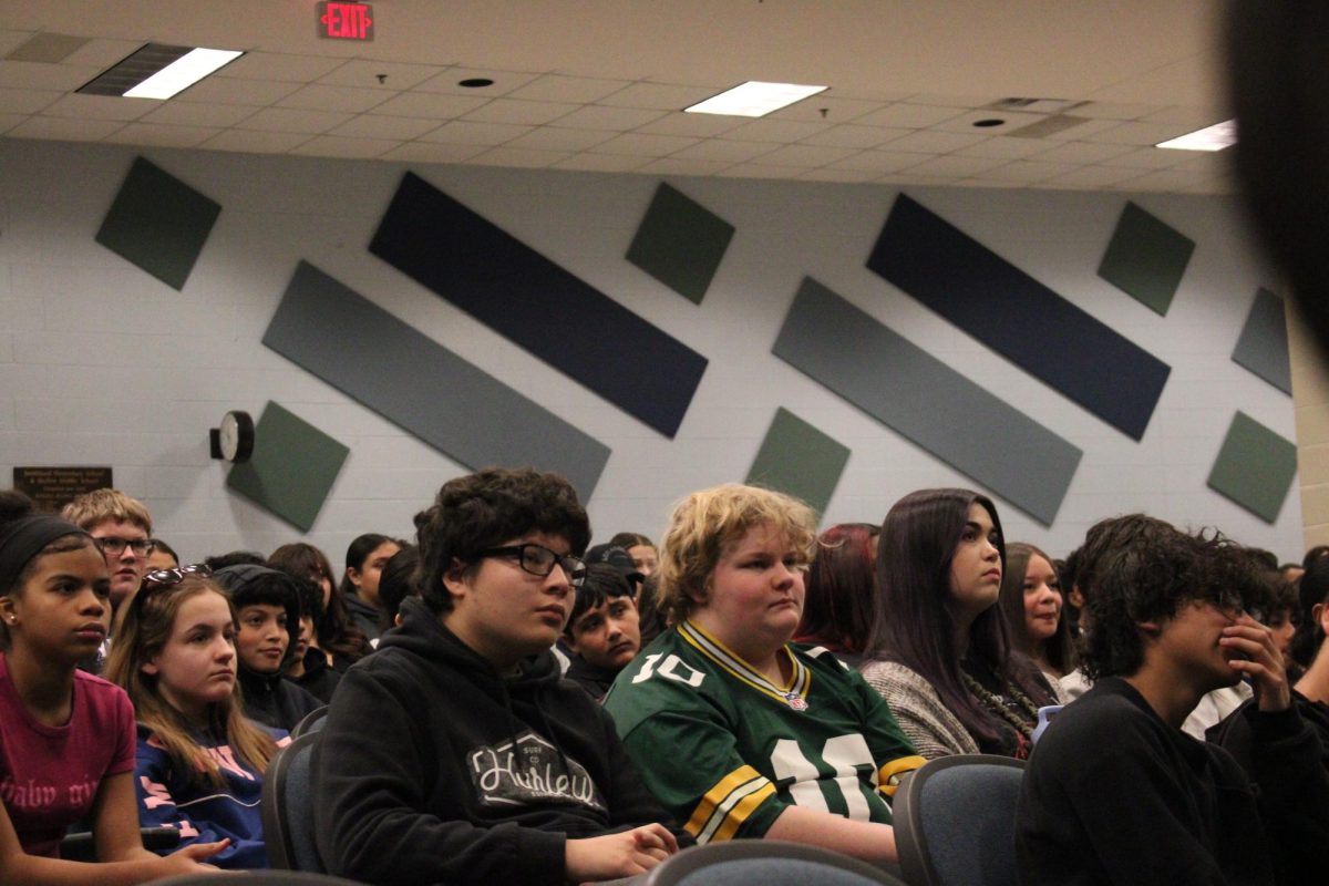 Skyline eight graders amused by the step performance.