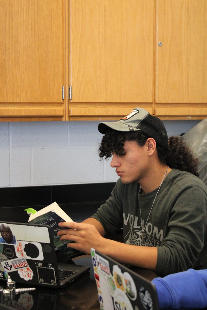Dominic Rodriguez reading his book. 
