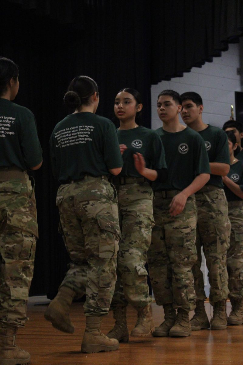 Step team finishing their step routine for the middle school