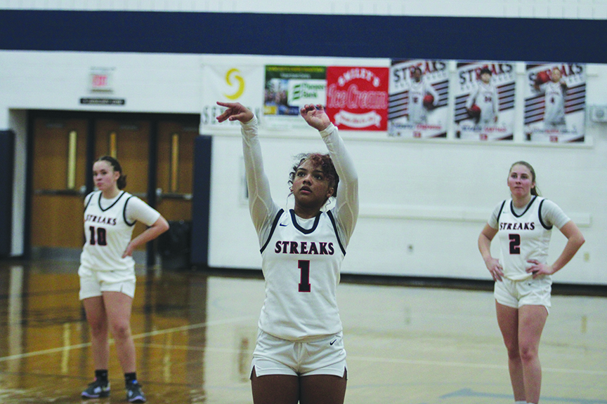 Sophomore Alyse Sheffey follows through after her free throw. 