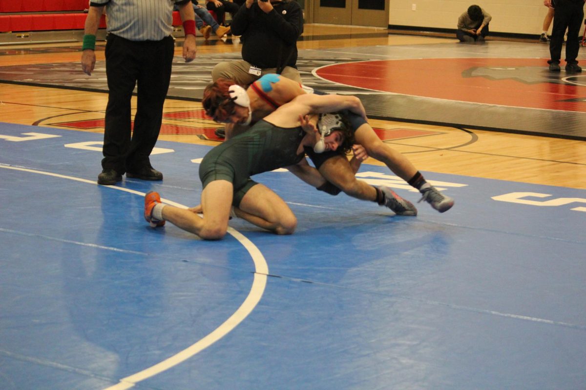 Senior Izaack Cruz manages to take control of his opponent.