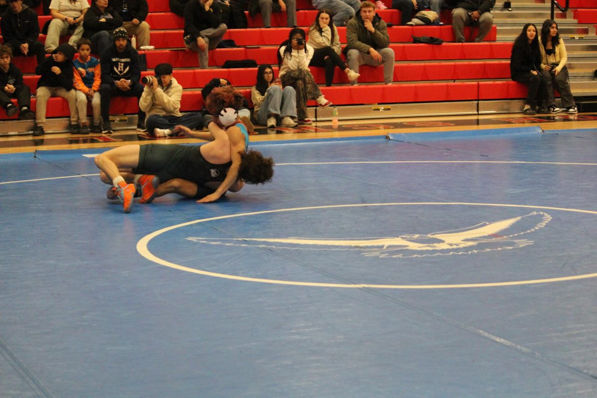 Senior Izaack Cruz locks up his opponent. 
