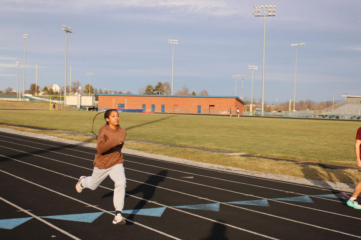 Freshman Gabrielle-Jackson running build ups at track practice.