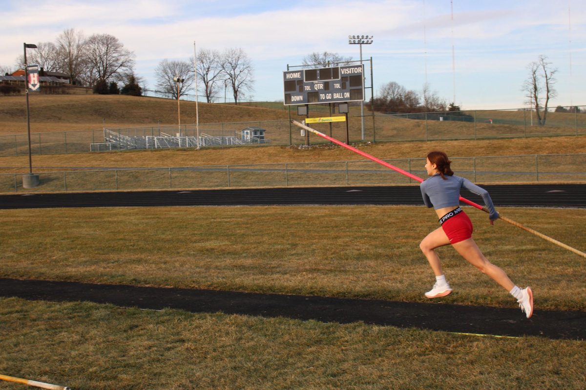 Junior Liva Jwanmery Working on Pole Vault at practice
