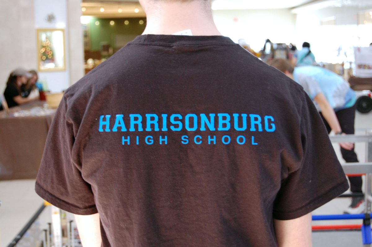 Sophomore Samuel Walton sports Gear up shirt with "Harrisonburg high school" written on his shirt.